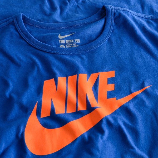 blue orange and white nike shirt