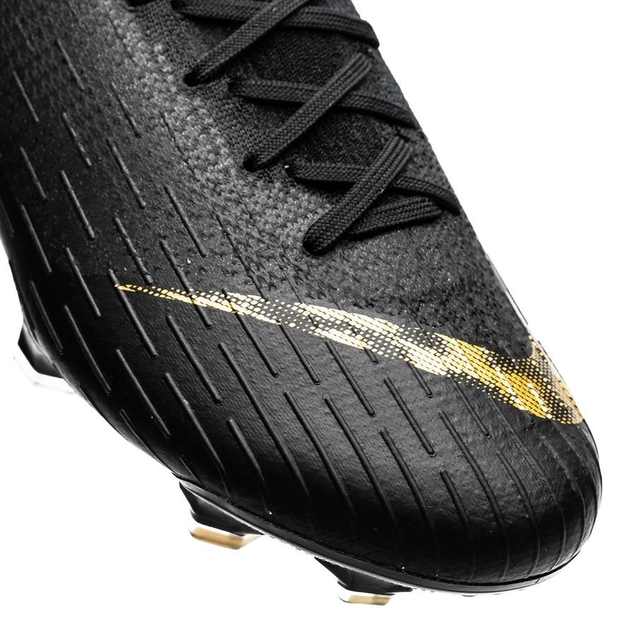 nike football boots black gold