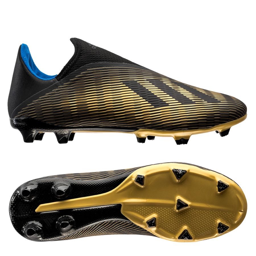 gold laceless football boots