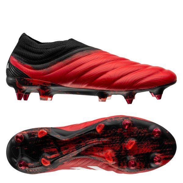 red and black adidas football boots