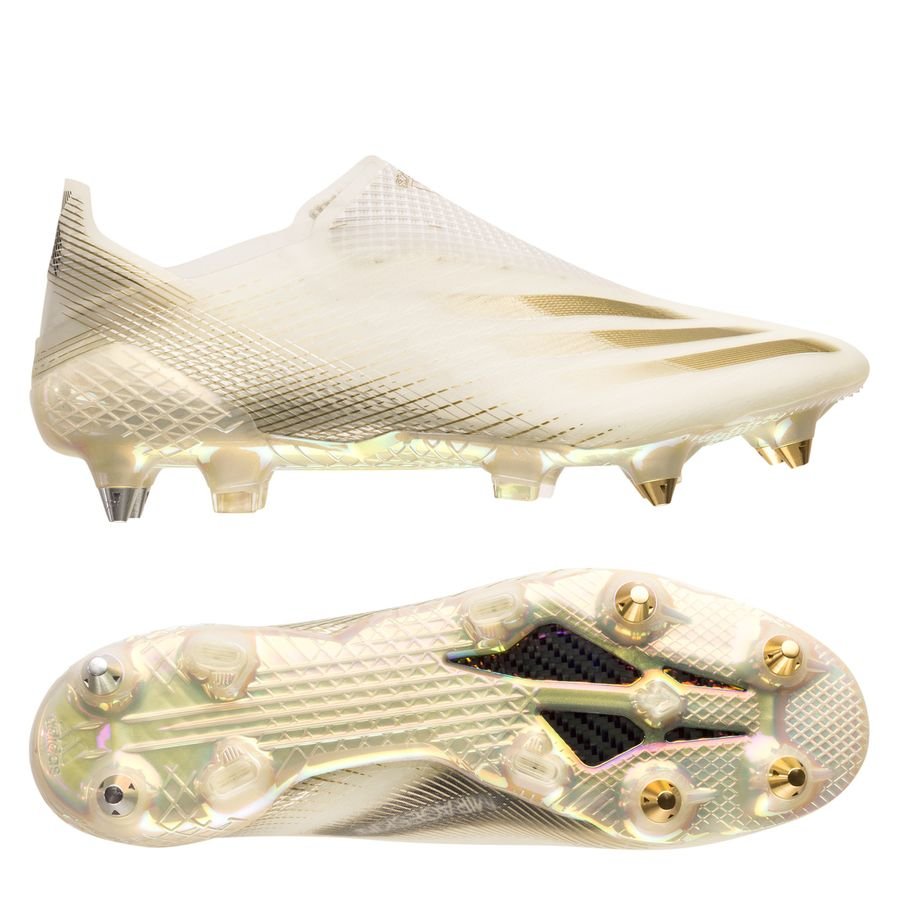 white and gold adidas football boots