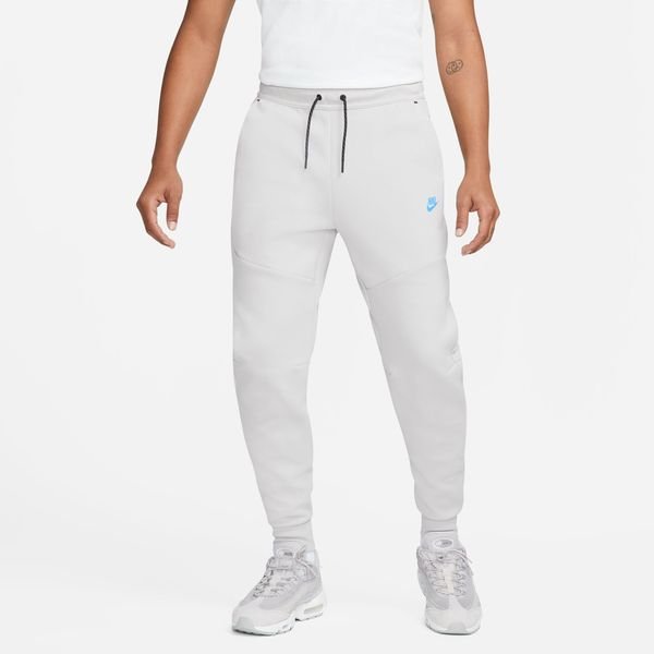 Nike Spodnie dresowe NSW Tech Fleece - Szary/Baltic Blue | www.unisport.pl